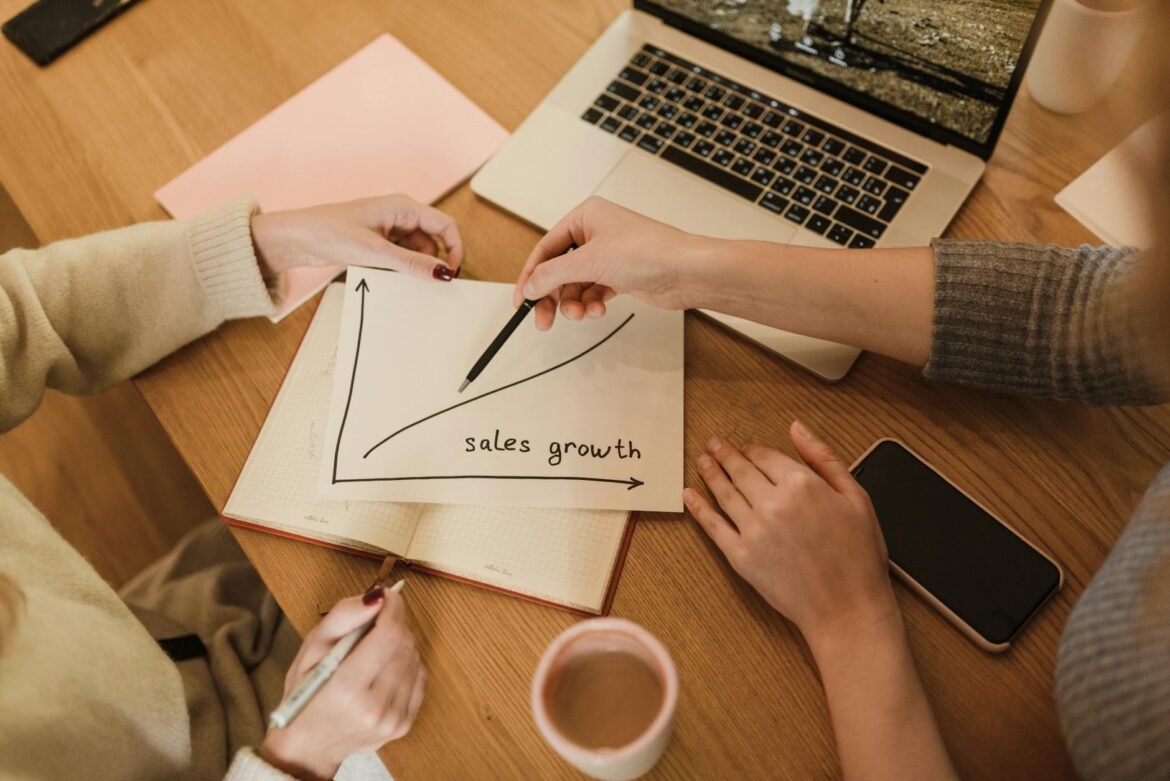 women with sales growth graph